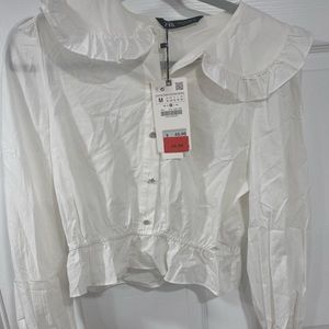 White peplum top